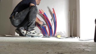Perverted plumber gets horny while he&rsquo;s working on radiator plumbing in construction